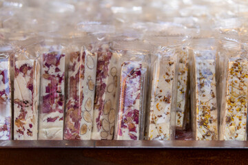 Obraz premium Rose Petal and Nut Nougat Packaging Close Up