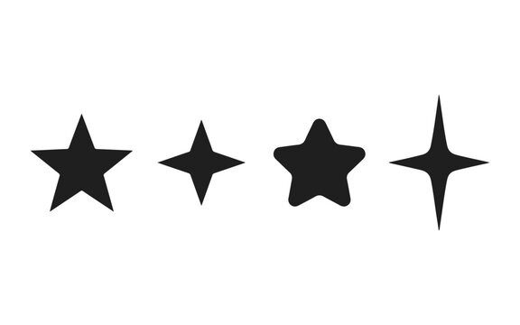 Set of four different black star shapes and sparkle icons isolated on a white background