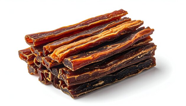 A stack of savory smoked dried beef jerky meat strips snack on clean white backdrop