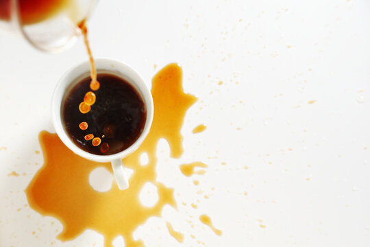 Pouring Coffee Splashing From Cup