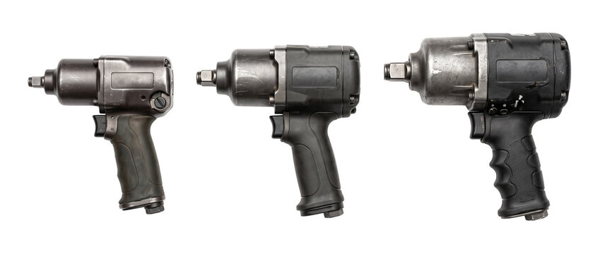 Pneumatic impact wrench tool set in three sizes isolated on black background, professional mechanic equipment, heavy duty air power tools for automotive repair, maintenance, industrial workshop hardwa