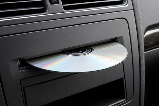 Close up view of cd inside car audio system
