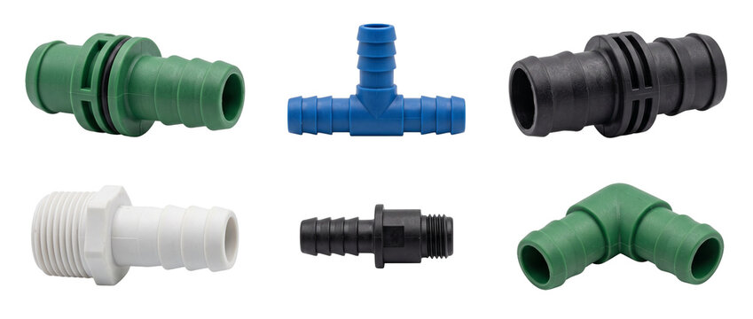 Plastic hose connector pipe fittings set for drip irrigation and plumbing adapter joint set isolated on black background, industrial equipment components for garden water system, repair and hardware