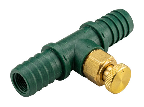 Garden hose connector pipe fitting green plastic T-joint with brass valve for drip irrigation system watering hardware component isolated on black background for plumbing and agriculture concept