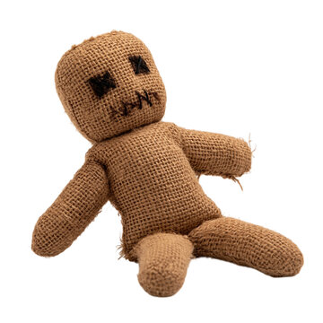 Brown burlap voodoo doll figure isolated on transparent background png cutout