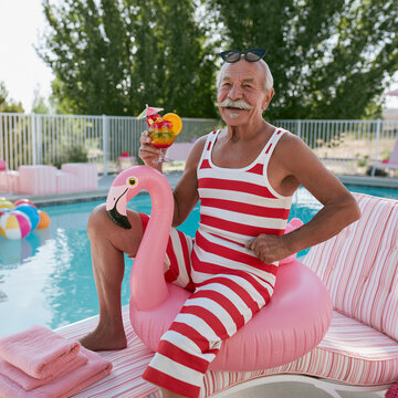 Joyful moments by the pool with colorful drinks and a playful atmosphere Generative AI