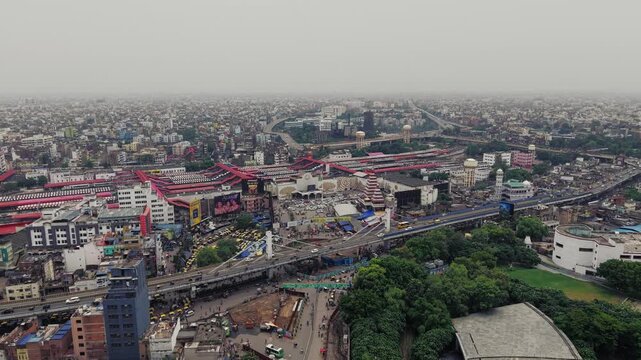 Aerial view of Patna, Bihar, India, showcasing the dense urban landscape, residential buildings, modern infrastructure, and busy roads of the city. Patna's rapid urban development