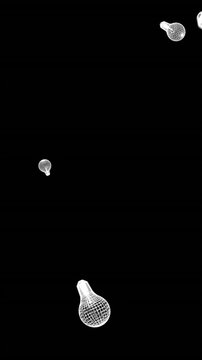 Animation of light bulb icons moving on black background