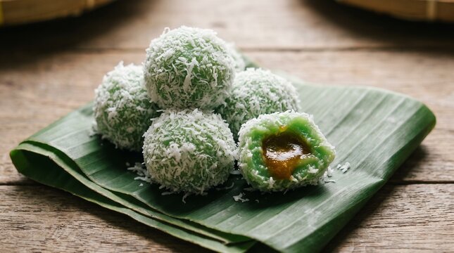Klepon traditional Indonesian sweet rice cake with palm sugar
