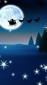 Animated Santa in sleigh with reindeer under moon, celebrating Christmas.