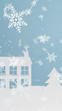 Animation of snow falling over winter scenery with trees and houses on blue background