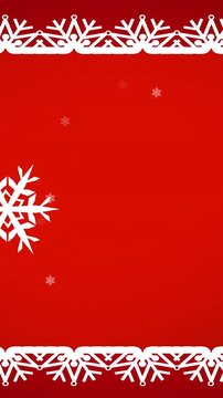 Digital animation of snowflakes moving over christmas traditional frame on red background