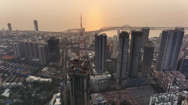 A breathtaking aerial view of Mumbai&rsquo;s high-rise buildings, showcasing the city&rsquo;s iconic skyline and rapid urban transformation. Captured from above, this perspective reveals the scale of urban Mumbai