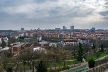 Naklejka premium View of Prague cityscape with a park and modern towers