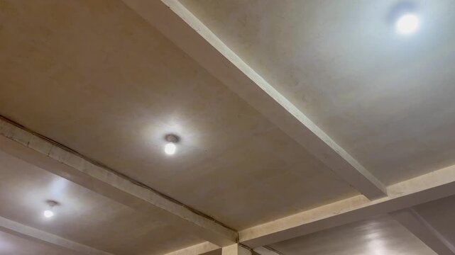 Simple Ceiling Design With Round LED Light Fixture In Residential Room