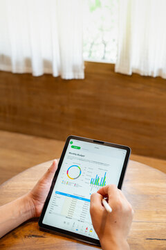Digital Budget Spreadsheet on Tablet With Stylus for Financial Management
