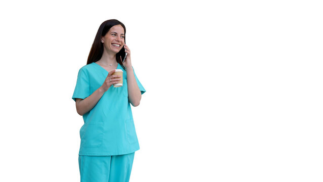 Smiling healthcare worker talking on phone during coffee break
