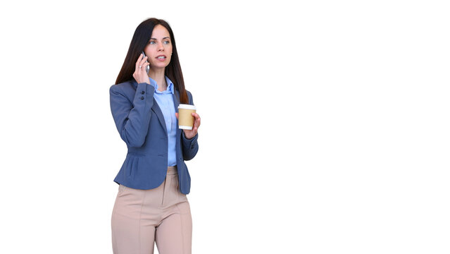 Businesswoman talking on phone and holding coffee cup