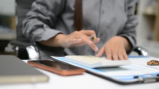 Woman signing auto insurance contract with agent after car crash claim. Trustworthy vehicle protection, policy coverage, and financial deal.