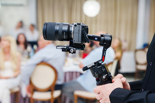 2026.06.23, Russia, Videographer Operating DJI RS4 Gimbal Stabilizer Setup at Banquet