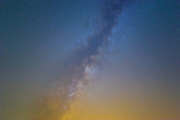 closeup milky way on the night starry sky background © Yuriy Kulik