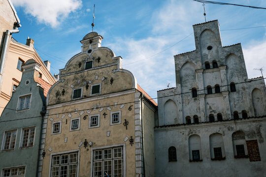 Low-angle view of the iconic Three Brothers historic medieval residential houses with decorated gables in Riga Old Town, Latvia