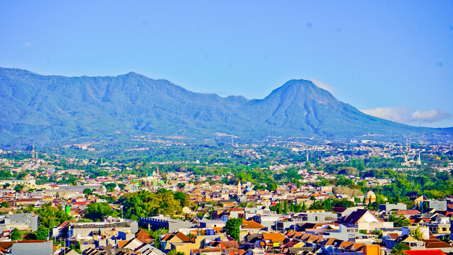 Beautiful view of Malang city with Mount Kawi in the background.