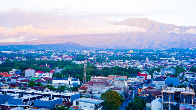 Beautiful view of Malang city with Mount Kawi in the background.