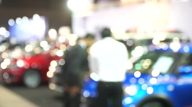 A motor show is a public exhibition that showcases current automobile models, debut concepts, and groundbreaking automotive technologies.Blur and Soft Focus.