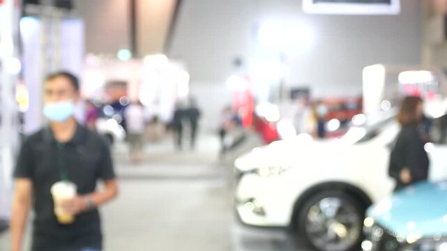 A motor show is a public exhibition that showcases current automobile models, debut concepts, and groundbreaking automotive technologies.Blur and Soft Focus.