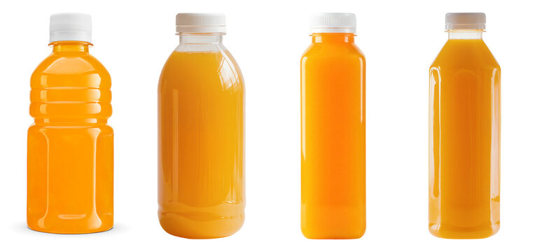 Collection of four plastic bottles filled with vibrant orange juice.