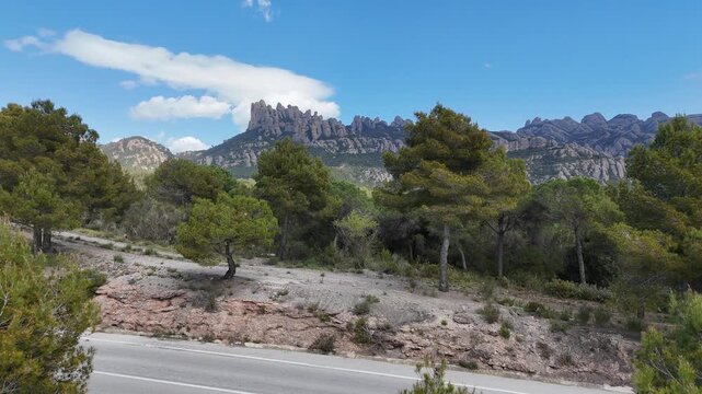 Montserrat Mountains view in Spain. A stunning natural landscape. This video showcases the beauty of the area. Experience the majestic mountain scenery.