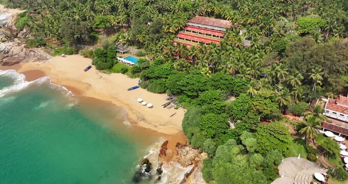 Aerial view of Karikkathi Beach near the Aazhimala Shiva Temple is a Hindu temple located on the coast of the Arabian Sea near Vizhinjam in the Thiruvananthapuram district of Kerala, India.