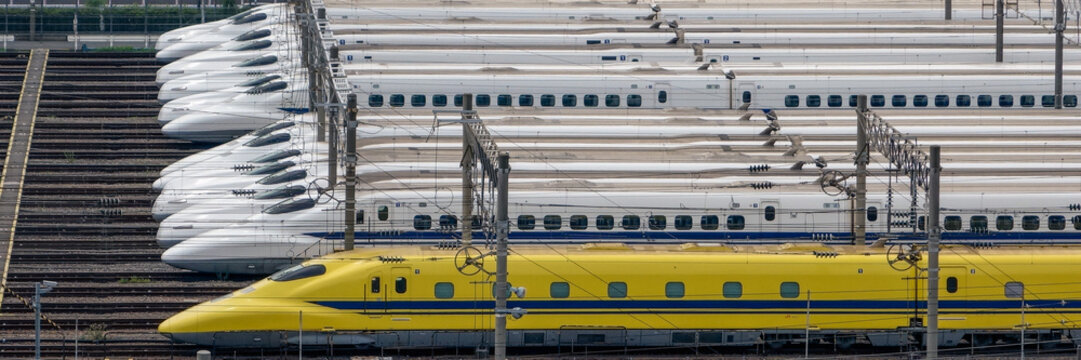 Tokyo, Japan - July 19 2013: Doctor Yellow inspection train and Tokaido Shinkansen bullet trains parked at Oi Rail Depot in Tokyo, Japan.