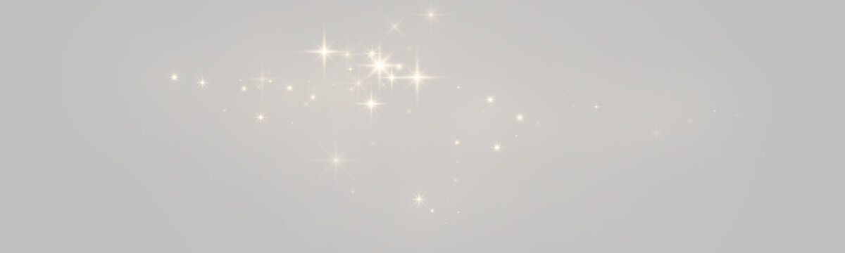 Scattered soft golden light sparkles with star-shaped glows on transparent background