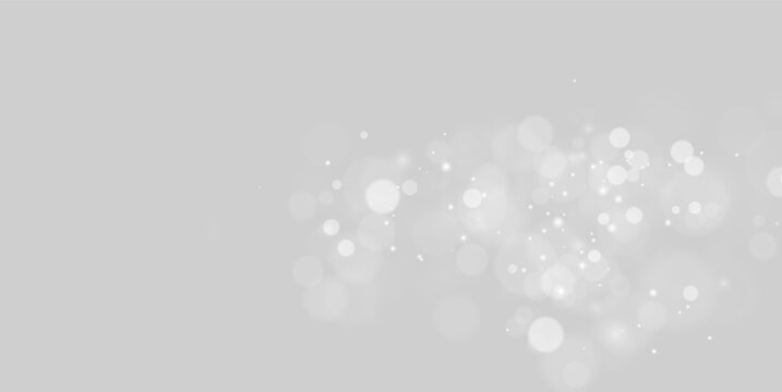 Soft white glowing bokeh lights scattered on transparent background with subtle sparkles on transparent background