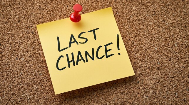 Yellow sticky note on a cork board with the text LAST CHANCE.