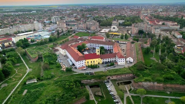 Aerial view of Arad fortress in Romania during sunset showing historic architecture and urban landscape.