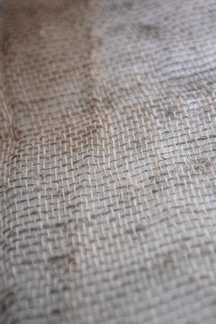 Natural burlap background, selective focus, close‑up