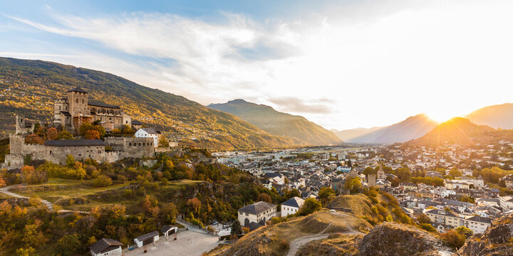 Switzerland, Canton Vaud, Sion, townscape with Notre-Dame de Valere at sunset
