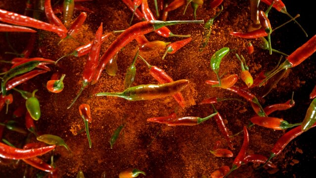 Freeze Motion Shot of Flying Red Chili Peppers