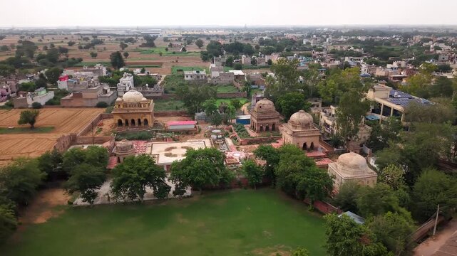 Aerial view of historic tombs and urban landscape of Tauru, Haryana, India