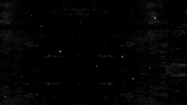 Black grunge gritty film texture with vintage scratches and dust, suitable for cinematic overlays, backgrounds, and effects