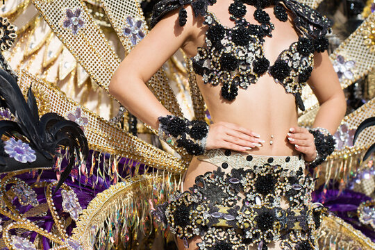 A woman in costume dancing on carnival, dancers during the carnival