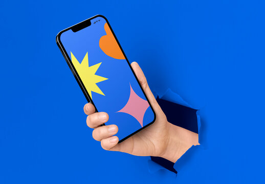 Vibrant Smartphone Mockup Emerging Through Paper PSD