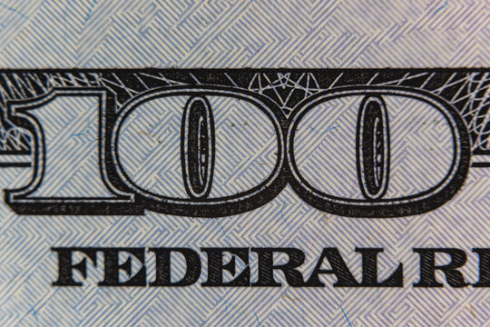 Extreme macro close up of microprinting typography and security pattern on US dollar banknote