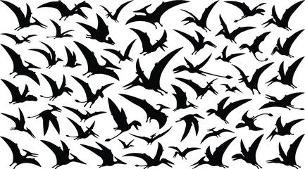 Large collection of black pterodactyl silhouette shapes flying together isolated on a white background for graphic design projects. © Shilpi