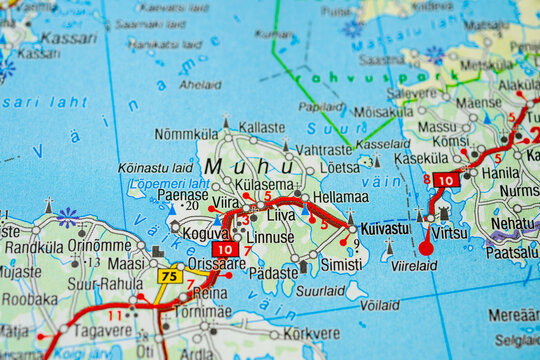 Macro photograph of printed map featuring Muhu island and surrounding area.