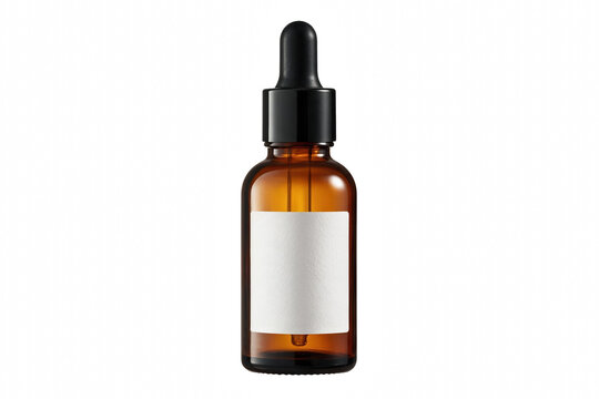 Amber glass dropper bottle with blank white label for cosmetic product branding