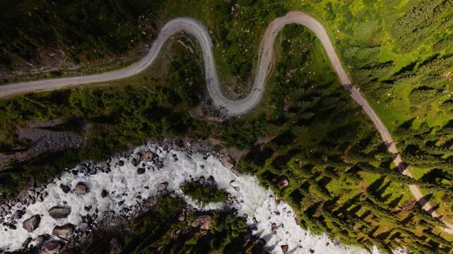 Top down aerial view of winding road in Karakol Kyrgyzstan